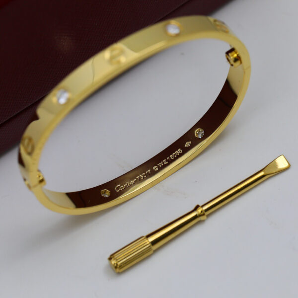 Cartier Love Bracelet, Yellow Gold, 4 Diamonds