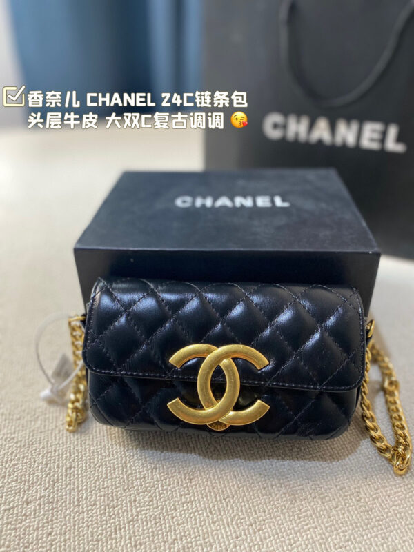 Chanel Flap (Black Leather) with Maxi Distressed Gold CC