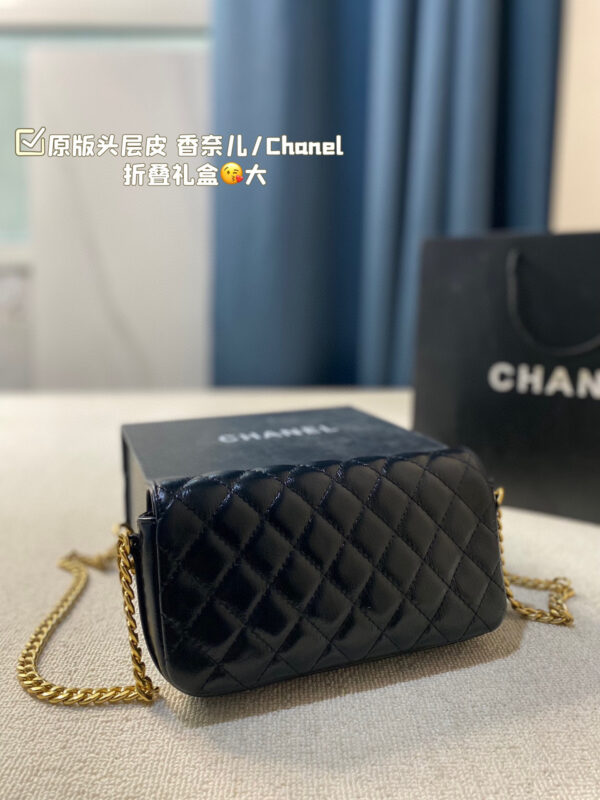 Chanel Flap (Black Leather) with Maxi Distressed Gold CC