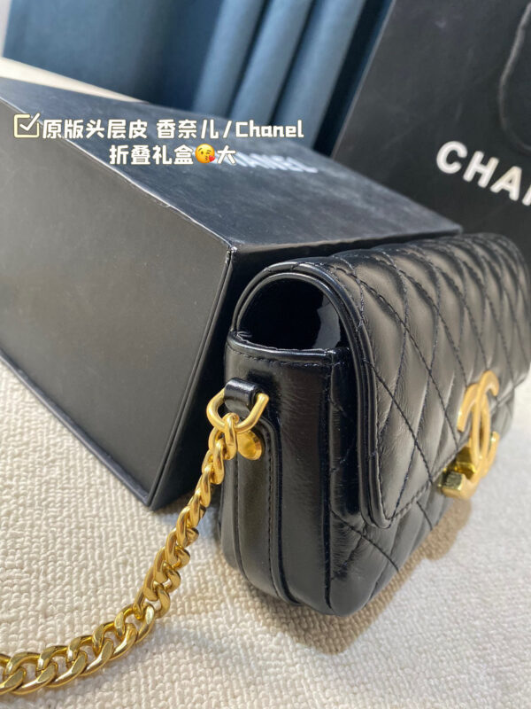 Chanel Flap (Black Leather) with Maxi Distressed Gold CC