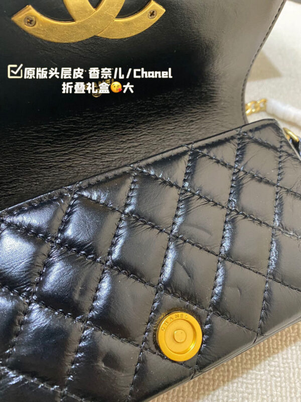 Chanel Flap (Black Leather) with Maxi Distressed Gold CC